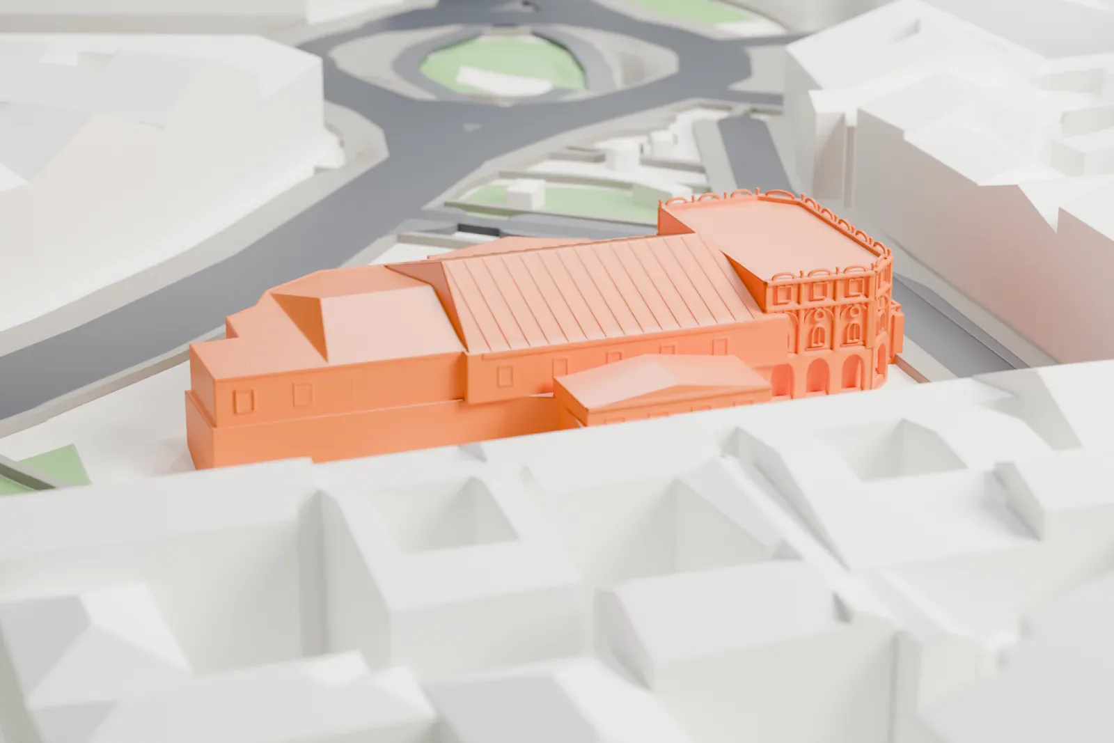 A white 3D print of the Teatro Dal Verme, standing among the surrounding streets and buildings of Milan.