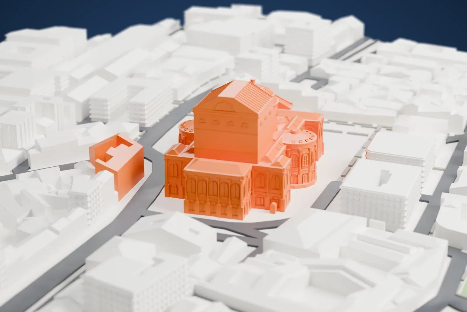 A white 3D print of the Teatro Massimo, a domed opera house with a tall stage house, standing on a paved square among dense city blocks.