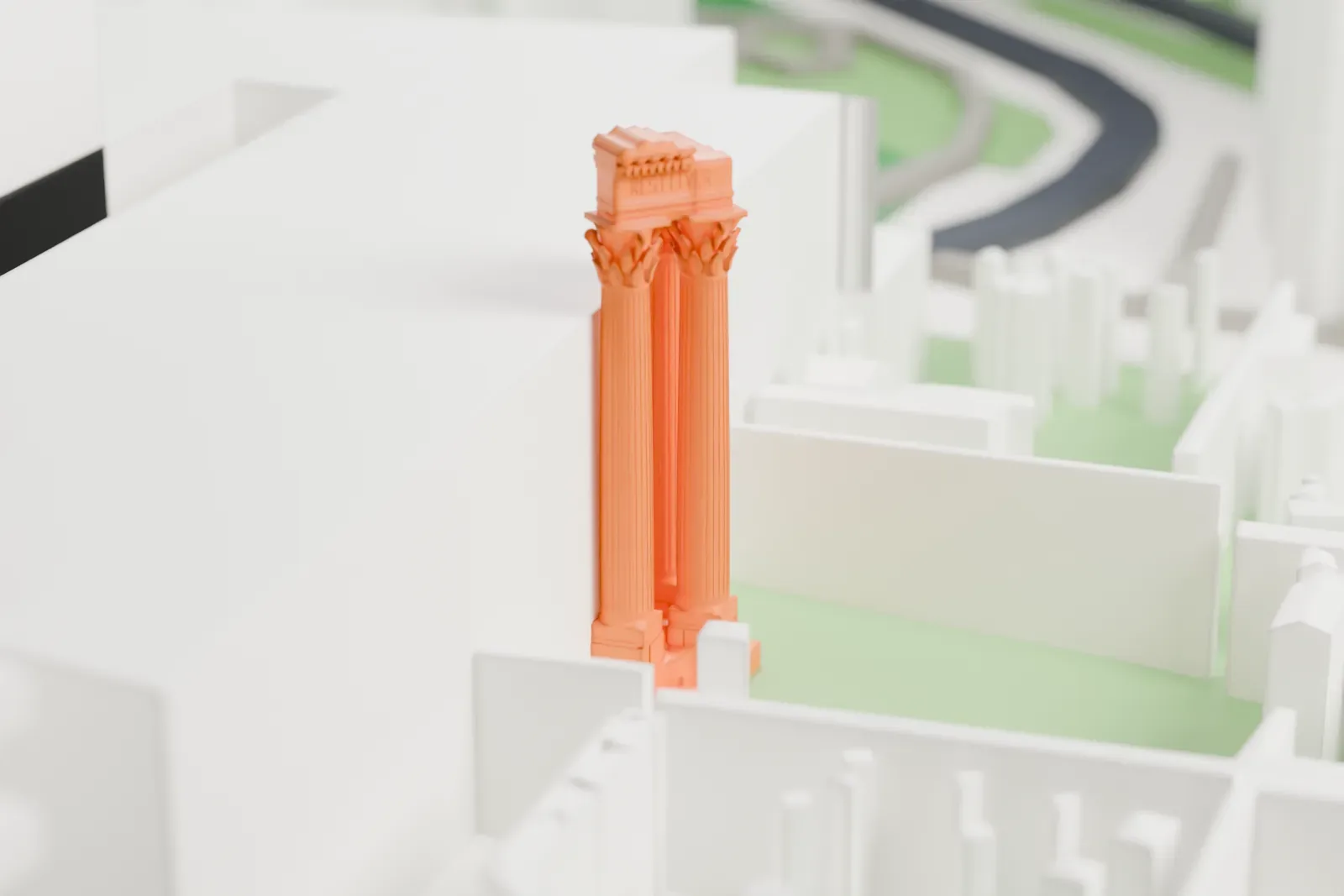 A white 3D print of the Temple of Vespasian and Titus among the surrounding streets and buildings.