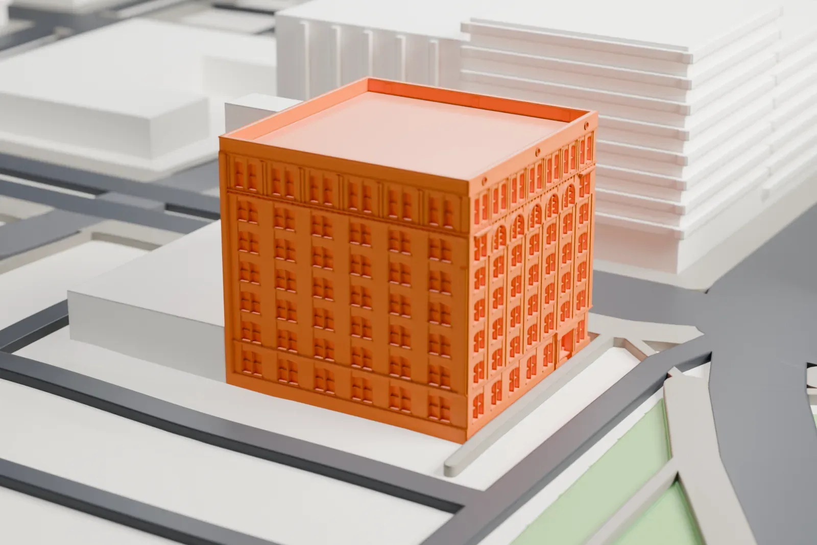 A white 3D print of the Texas School Book Depository, its seven stories facing Dealey Plaza with downtown streets around it.
