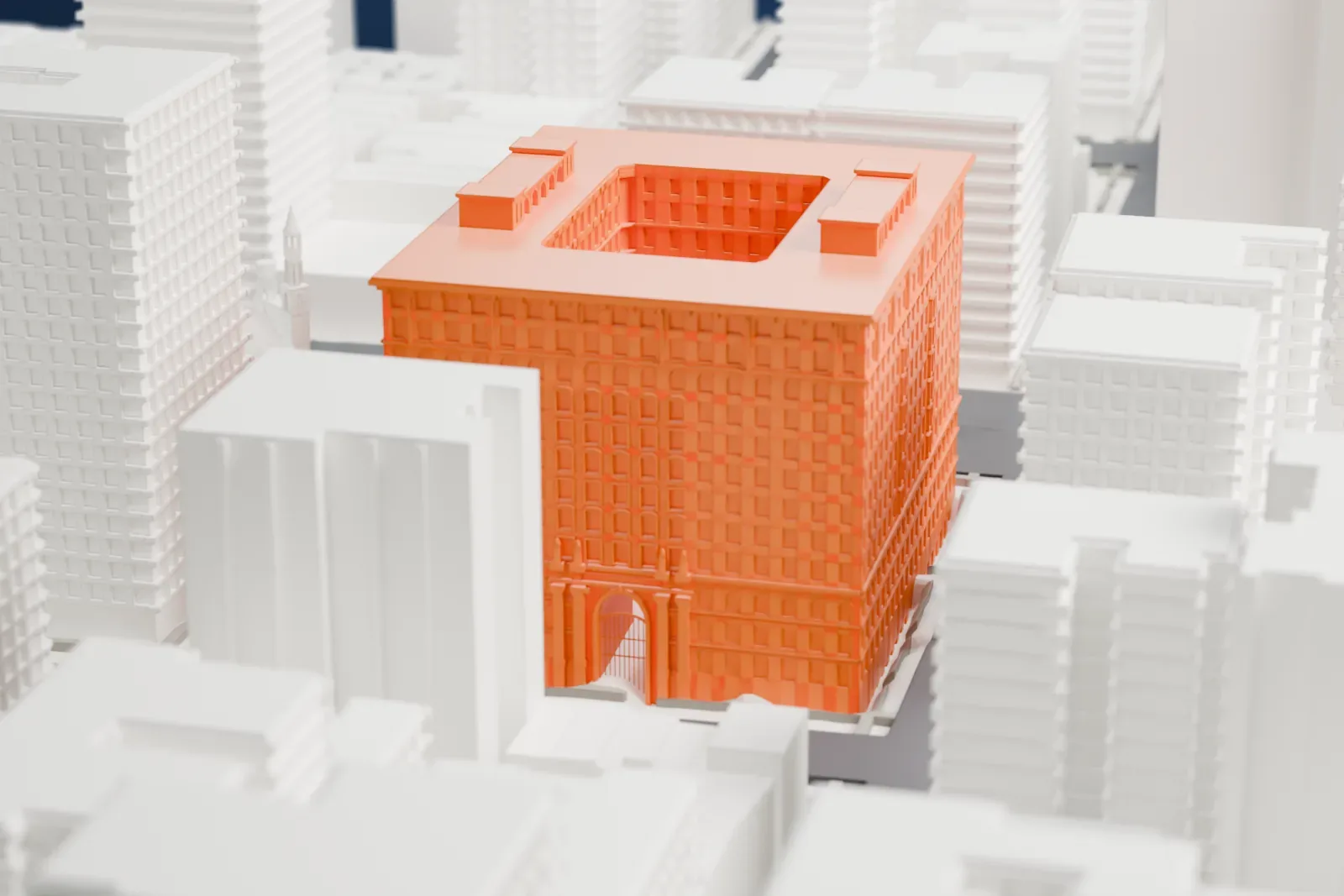 A white 3D print of The Apthorp, a square ring-shaped apartment building with an open courtyard, surrounded by blocks of lower and taller buildings.