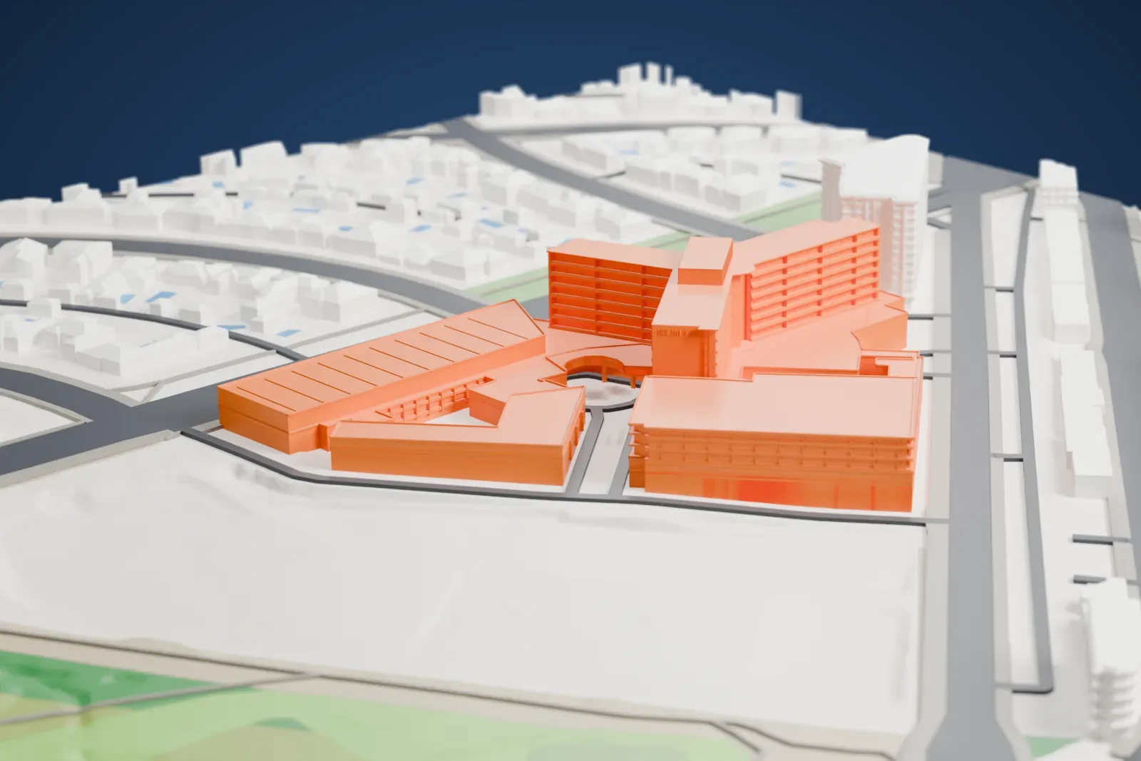 A white 3D print of The Beverly Hilton in Beverly Hills, with the surrounding streets and buildings around it.