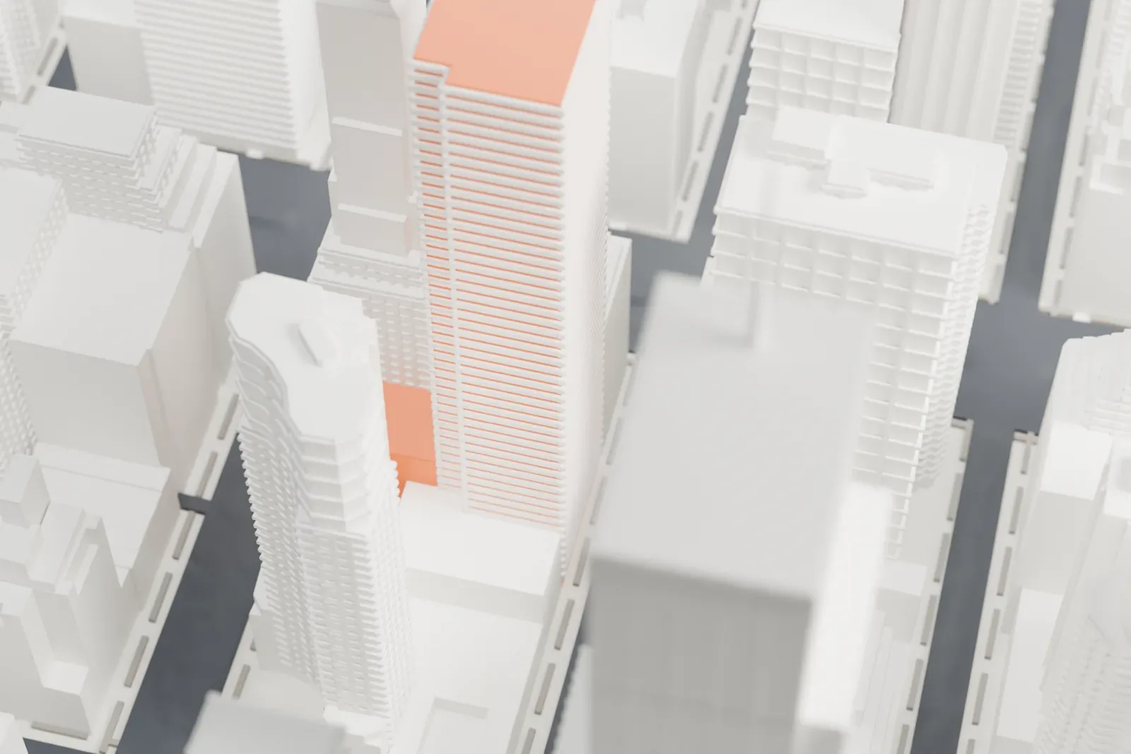 A white 3D print of The Galleria, a tall, narrow tower with a stepped top and a lower base, wedged among taller and shorter buildings in a dense block.