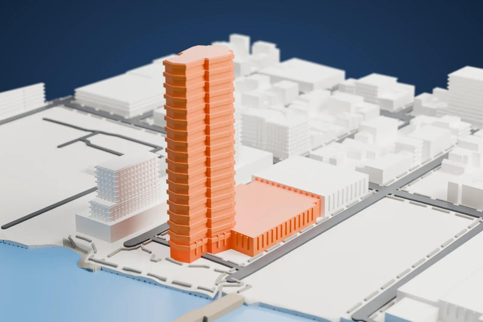 A white 3D print of The Greenpoint, a tall slender tower rising from a five-story block with a courtyard, beside the water with low buildings around it.