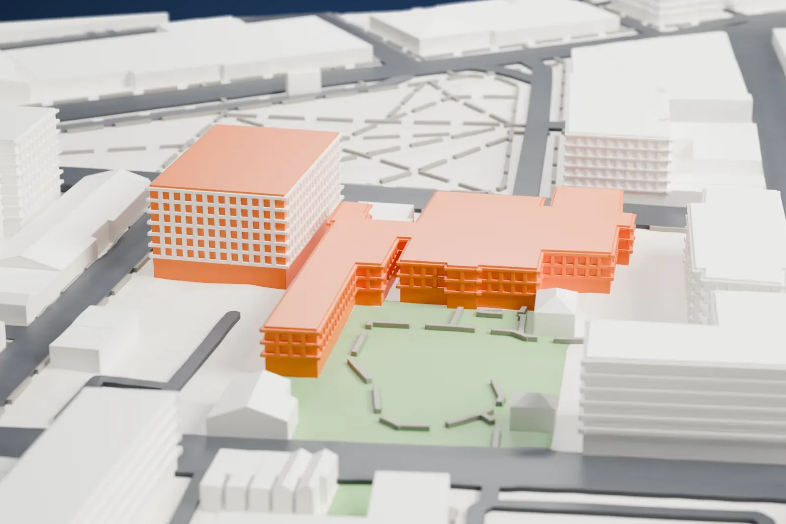 A white 3D print of The Newark Museum of Art, a cluster of connected blocks with arched front windows and a long rear wing beside a garden, among mid-rise buildings and streets.