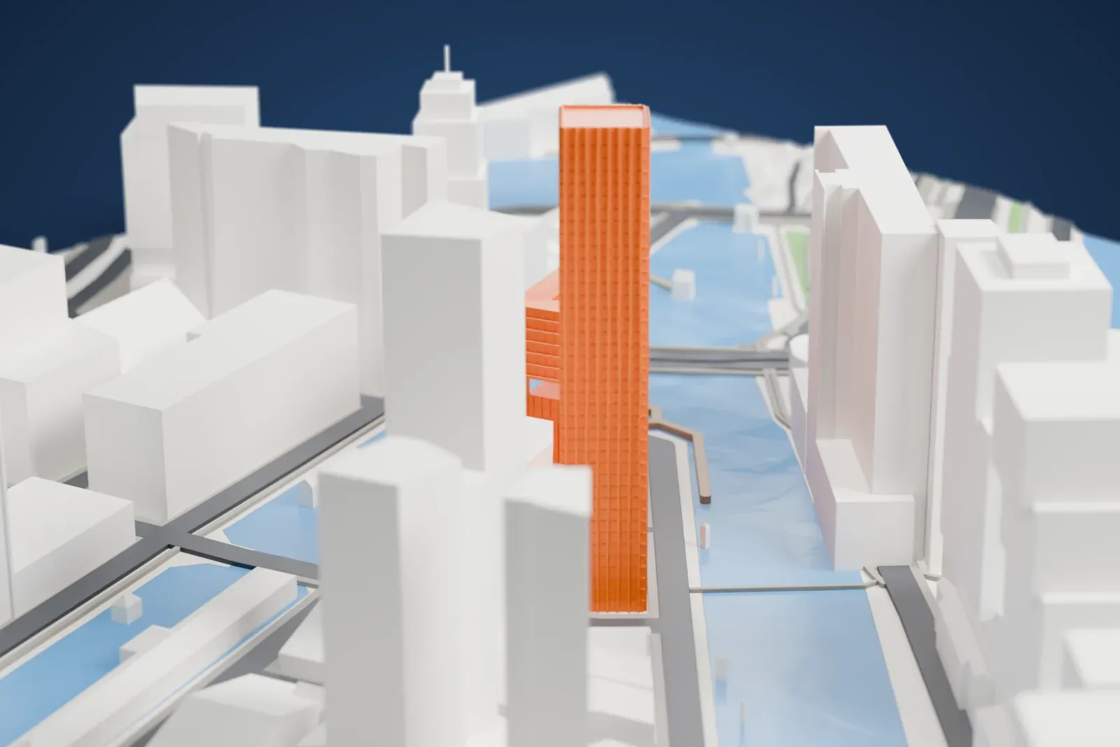 A white 3D print of The Red Apple, a tall residential tower standing among the streets, water and buildings of Rotterdam.