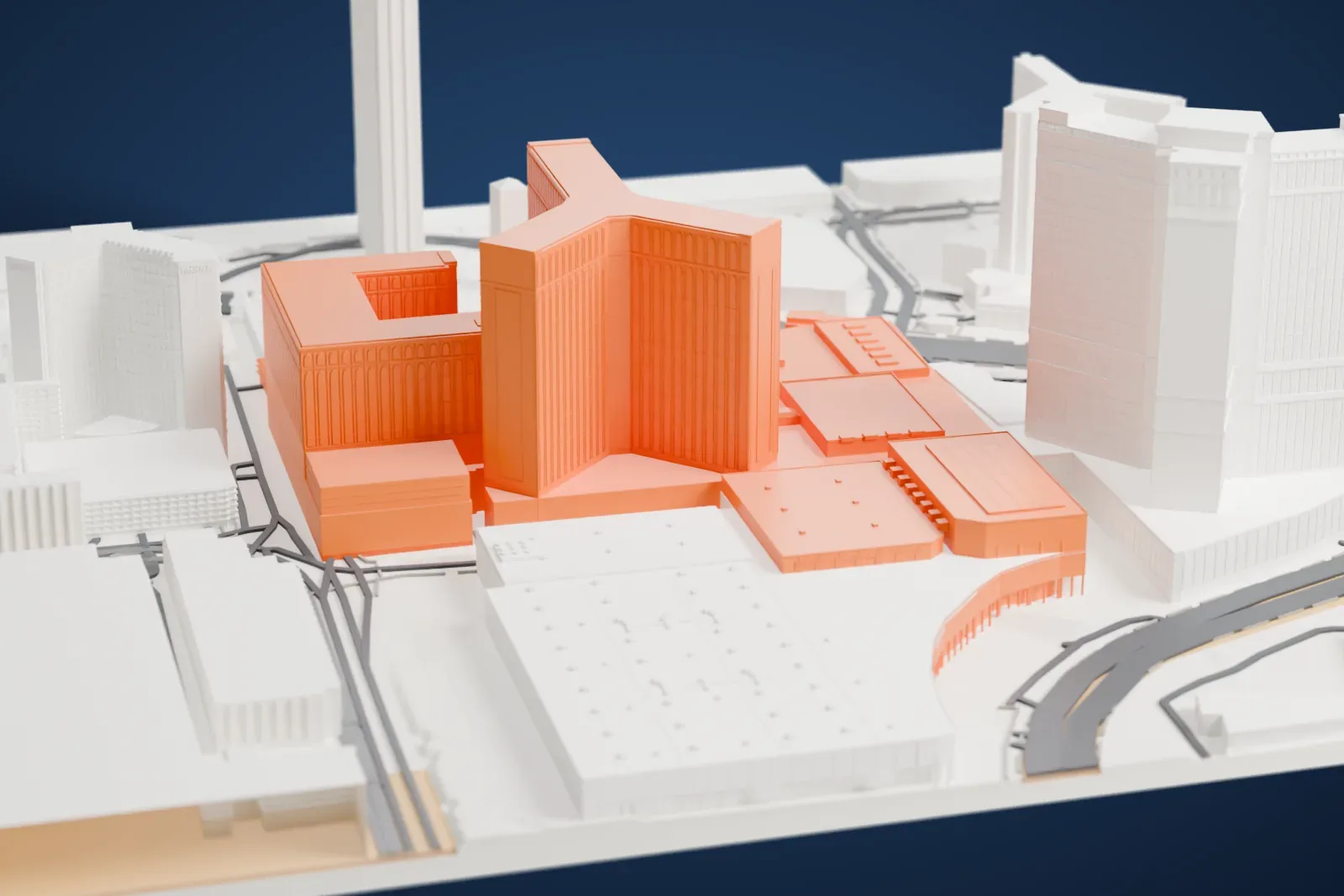 A white 3D print of The Venetian Las Vegas, a wide hotel tower with lower wings, standing among neighboring tall buildings and busy roads.