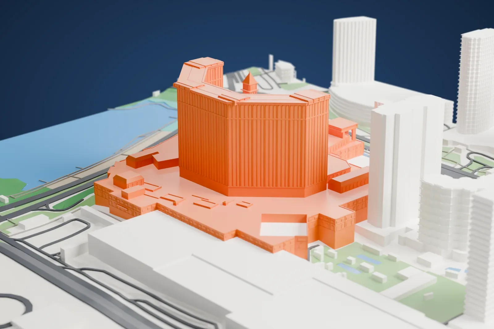 A white 3D print of the Venetian Macao, with its folded hotel tower, campanile and bridge among surrounding streets and buildings.