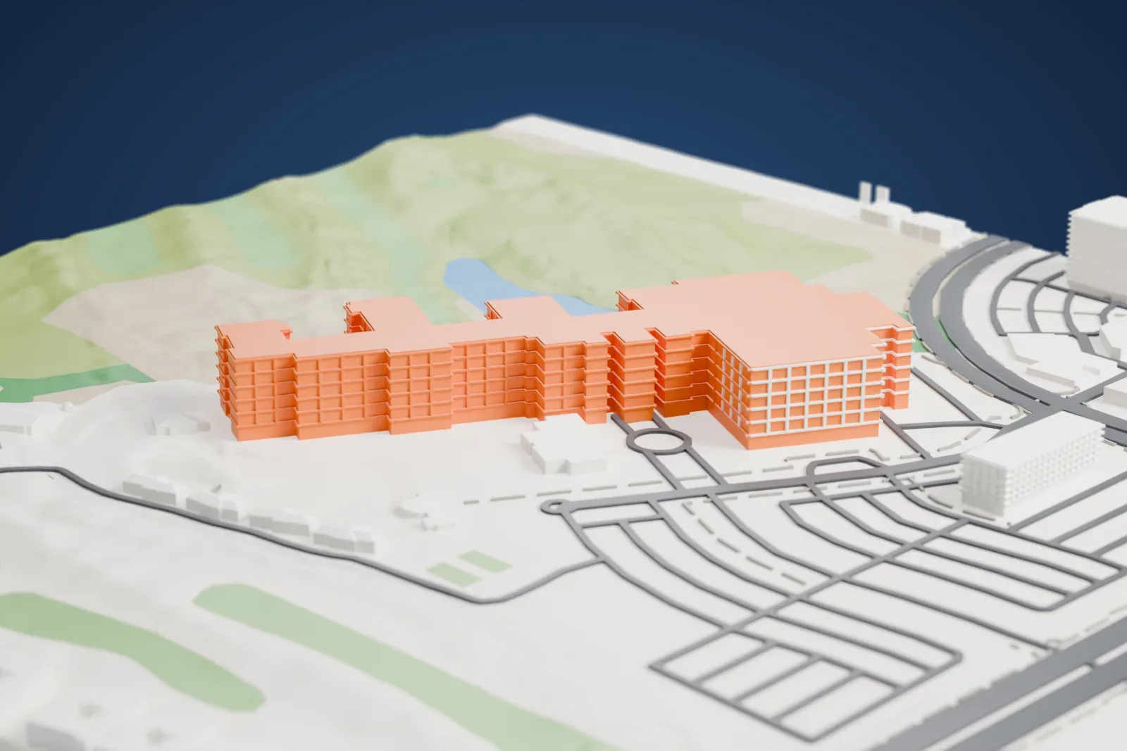 A white 3D print of The Westin Kierland Resort & Spa, a long chain of hip-roofed wings with a flat-roofed ballroom block, set between parking lots and a golf course with a pond.