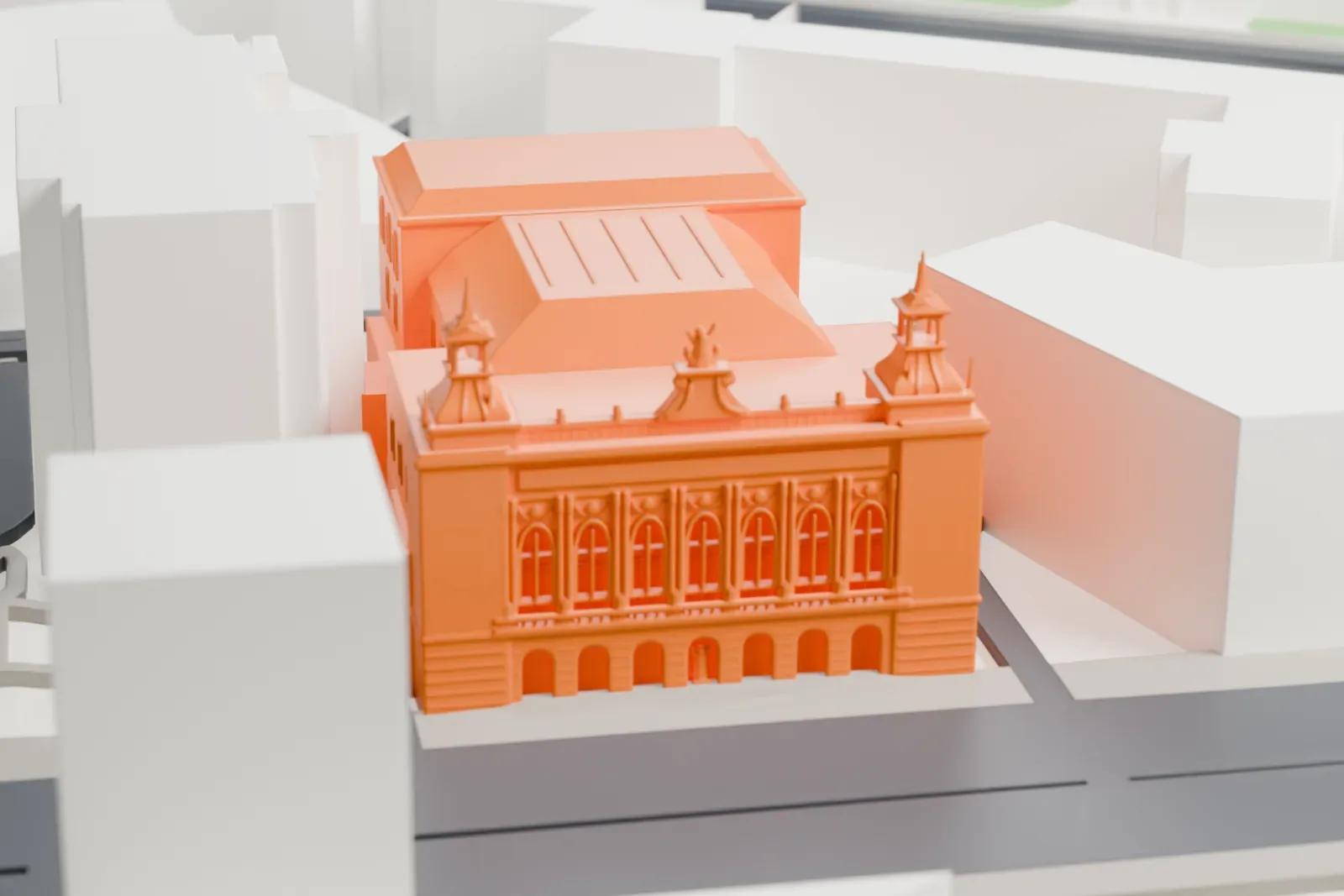 A white 3D print of the Theater des Westens in Berlin, standing among the surrounding streets and buildings of Charlottenburg.