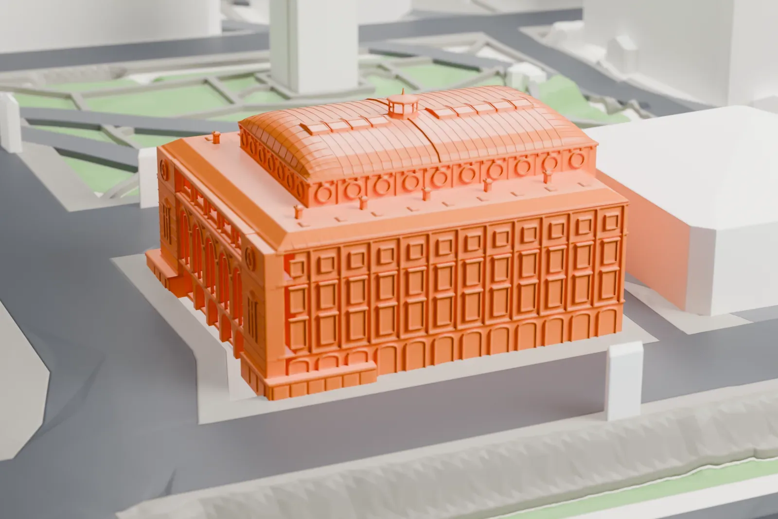 A white 3D print of the Théâtre de la Ville-Sarah Bernhardt, a 19th-century theater building among surrounding city buildings.