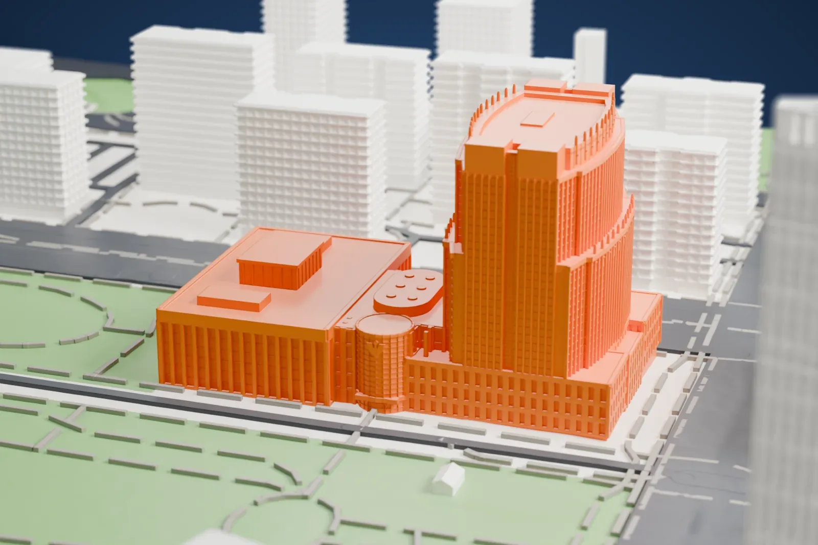 A white 3D print of the Theodore Roosevelt United States Courthouse, a tall curved tower rising from a lower wide wing with rooftop boxes, beside a park, streets and other buildings.