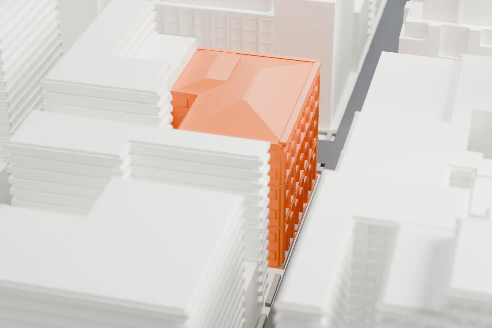 A white 3D print of the Tiffany and Company Building, a mid-rise block with a sloped roof and ornate cornices, hemmed in by taller Midtown buildings.
