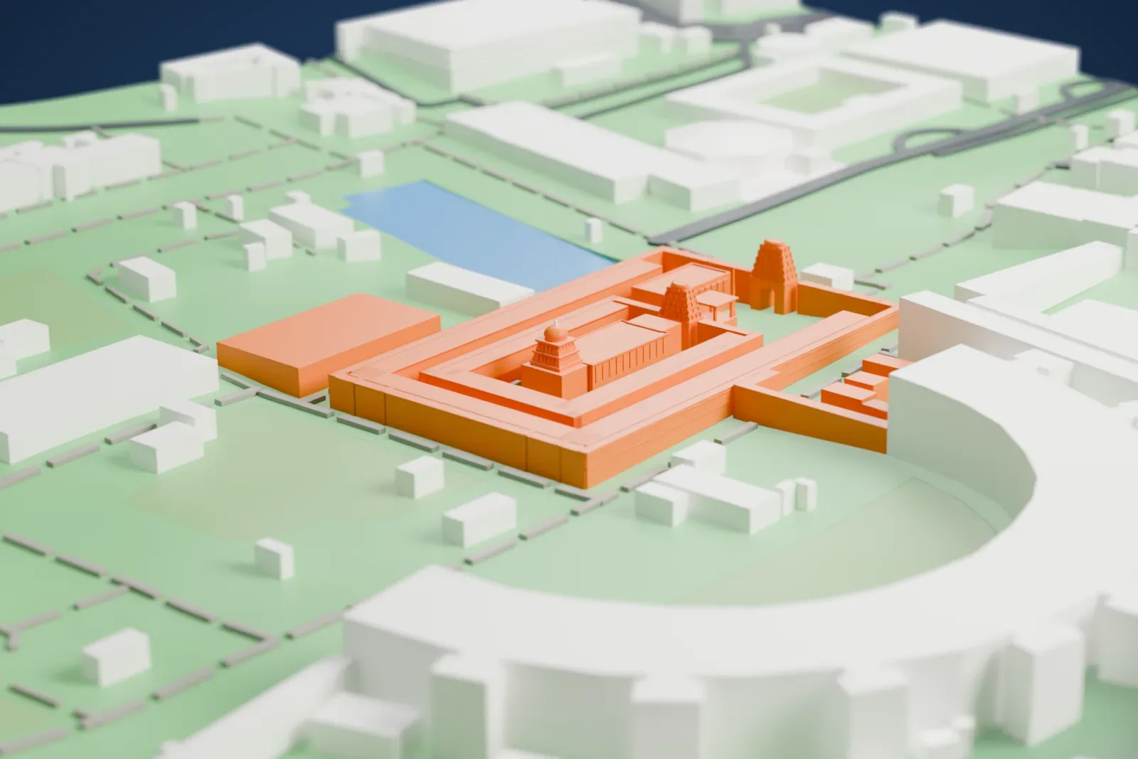 A white 3D print of the Tirumala Venkateswara Temple, a low, wide temple of nested rectangular courtyard walls with two tiered gateway towers and a small domed shrine, set among green ground, a water tank and low buildings.