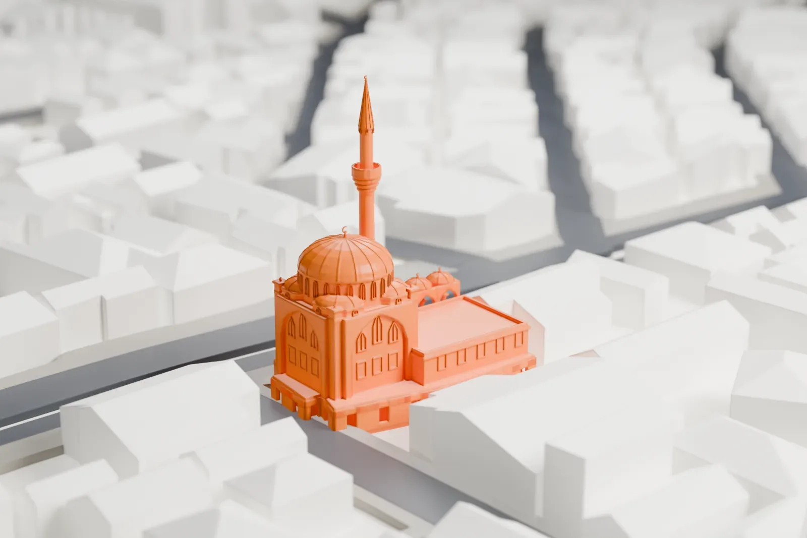 A white 3D print of the Tokyo Mosque, a domed mosque with a minaret, among the surrounding buildings of Shibuya.