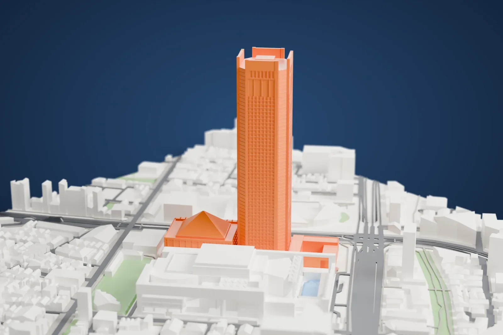 A white 3D print of Tokyo Opera City Tower, a tall skyscraper standing among surrounding city buildings.