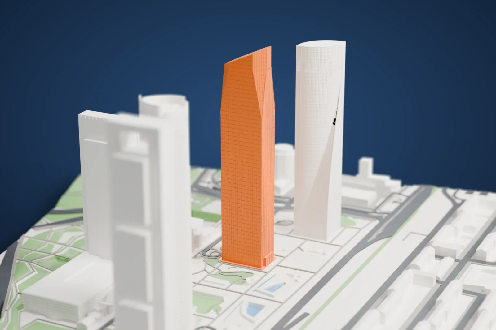 A white 3D print of the Torre de Cristal with the surrounding streets and buildings.
