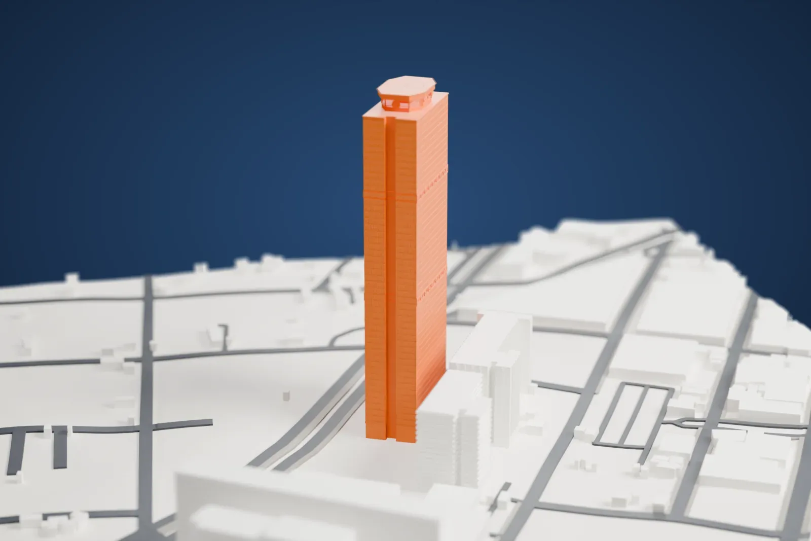 A white 3D print of the Torre Ejecutiva Pemex, a tall rectangular tower with bands of cross-bracing and a small crown, among surrounding streets and buildings.