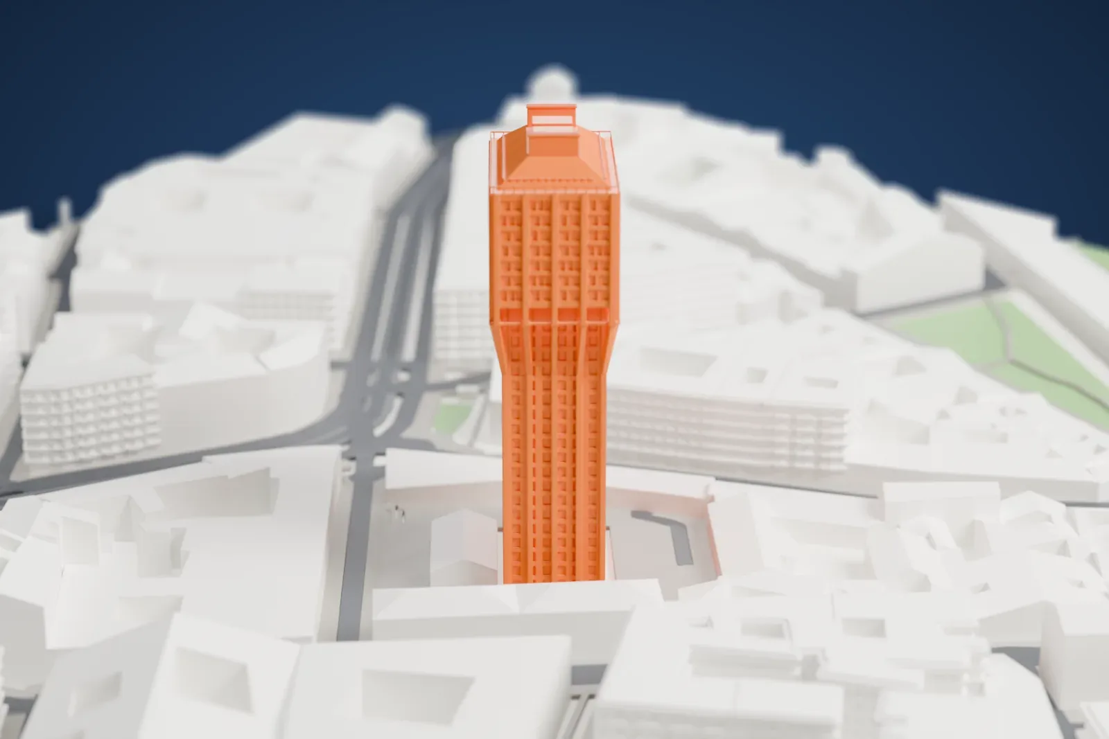 A white 3D print of Torre Velasca among the surrounding streets and buildings of Milan.