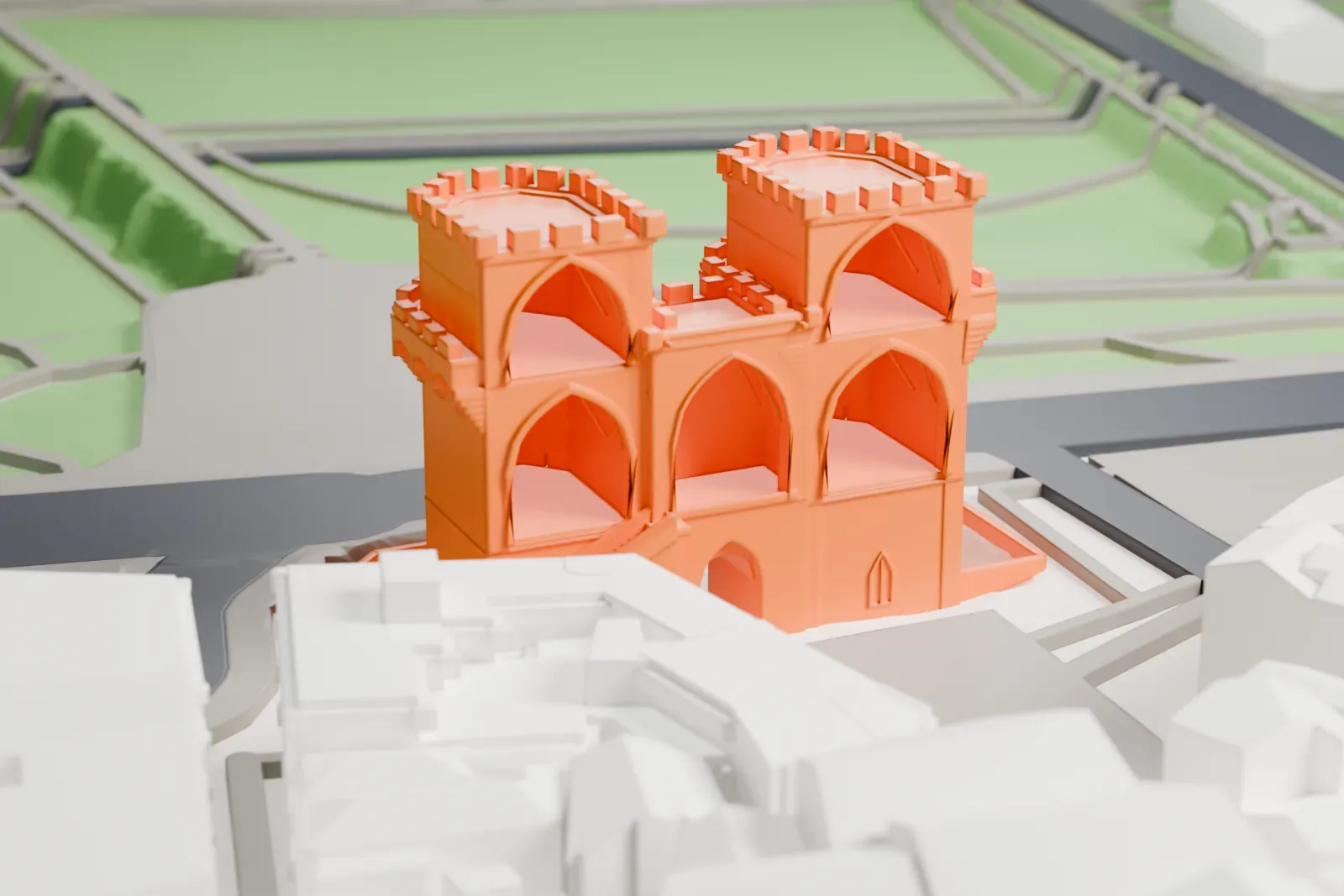 A white 3D print of the Torres de Serranos, twin Gothic gate towers with an open passage, among the surrounding streets and buildings of Valencia.
