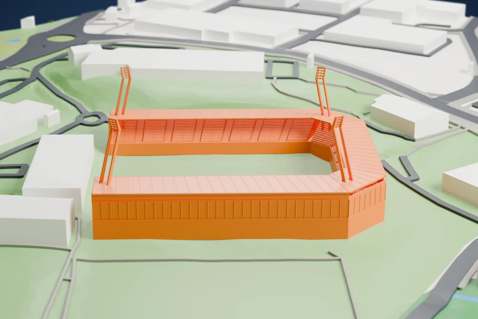 A white 3D print of Tórsvøllur, a stadium with three covered stands around an open pitch and four tall paired floodlight masts, on its sports ground.