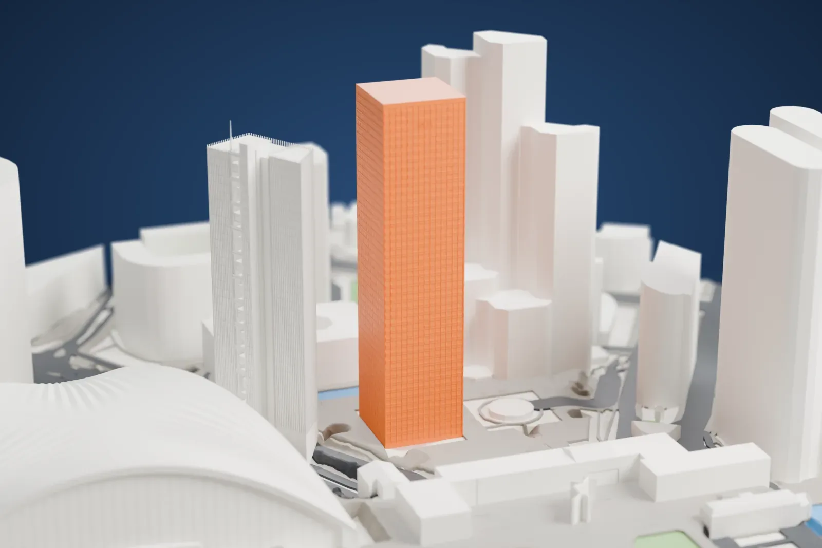 A white 3D print of Tour Areva, a tall square tower standing among the high-rise buildings of La Défense.