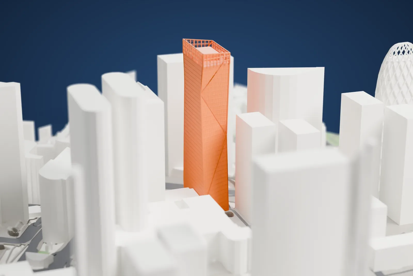A white 3D print of the Tour Carpe Diem, a tall office tower standing among the streets and buildings of La Défense.