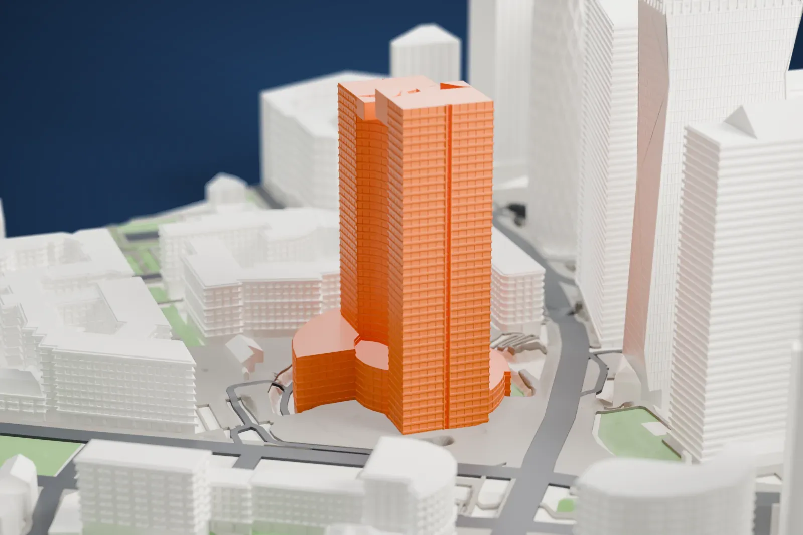 A white 3D print of Tour Eqho, an office tower, among the surrounding streets and buildings of La Défense.