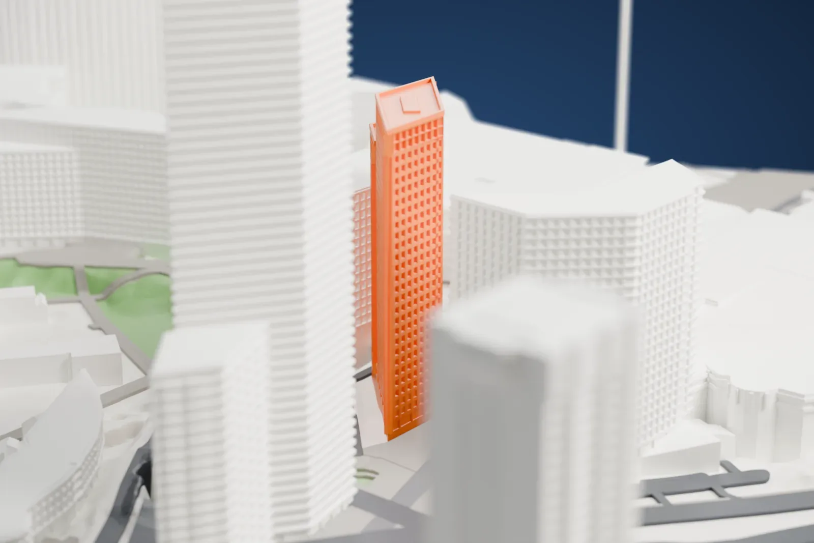 A white 3D print of Tour Landscape, shown among the surrounding streets and buildings.