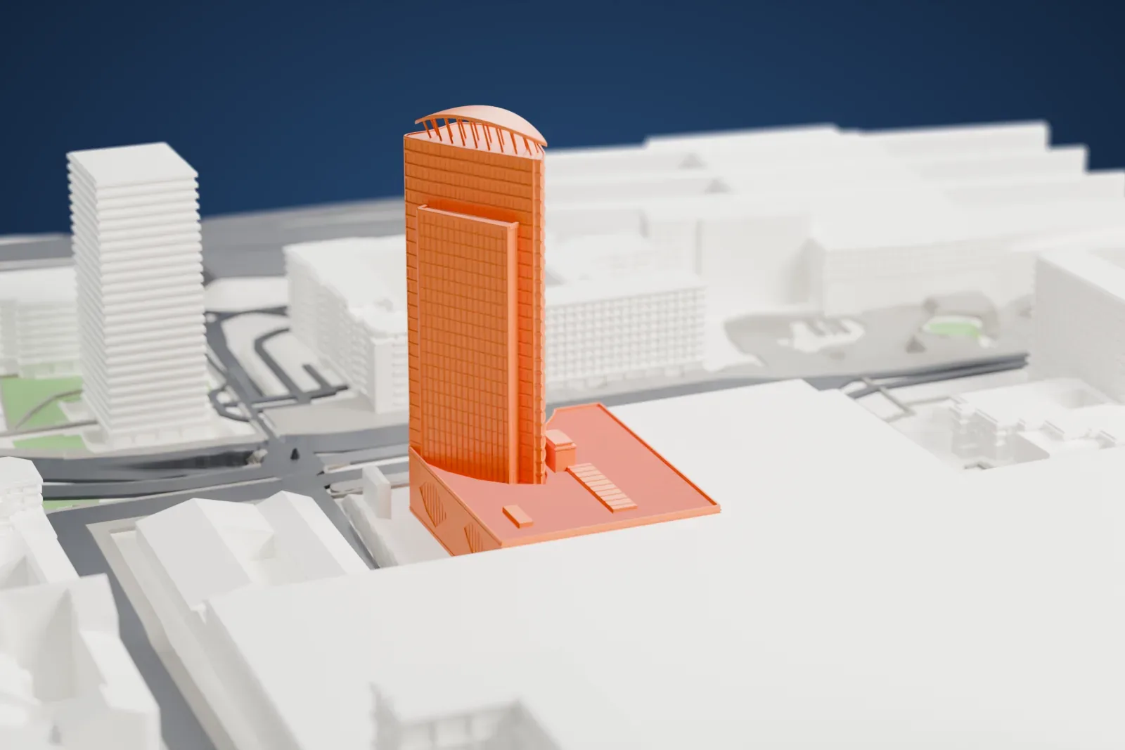 A white 3D print of the Tour Oxygène with the surrounding streets and buildings.