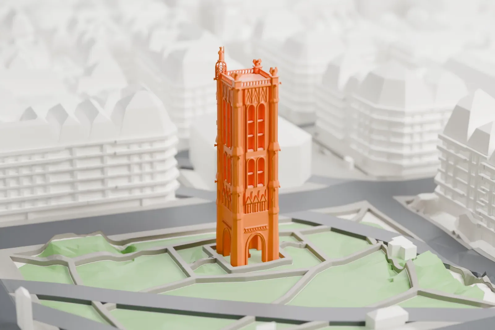 A white 3D print of the Tour Saint-Jacques in Paris, with the surrounding streets and buildings around it.