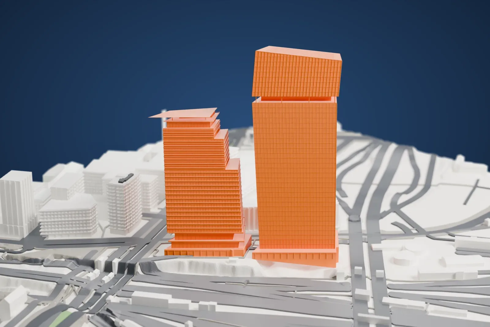 A white 3D print of Tours Duo, two tall towers, among the surrounding streets and buildings.