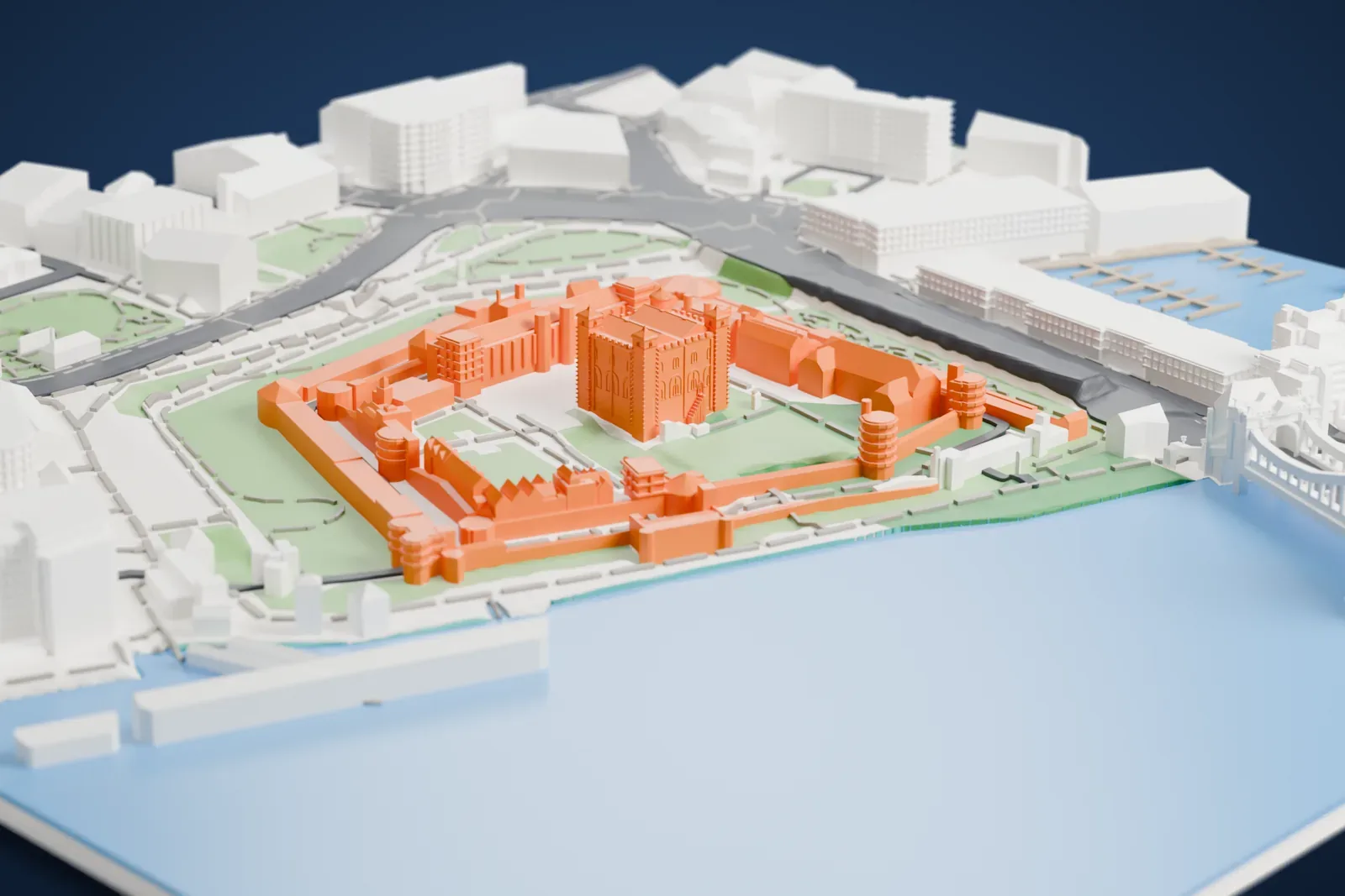A white 3D print of the White Tower at the Tower of London, a square stone keep with four corner turrets and a battlemented roofline, standing on a lawn near the River Thames.
