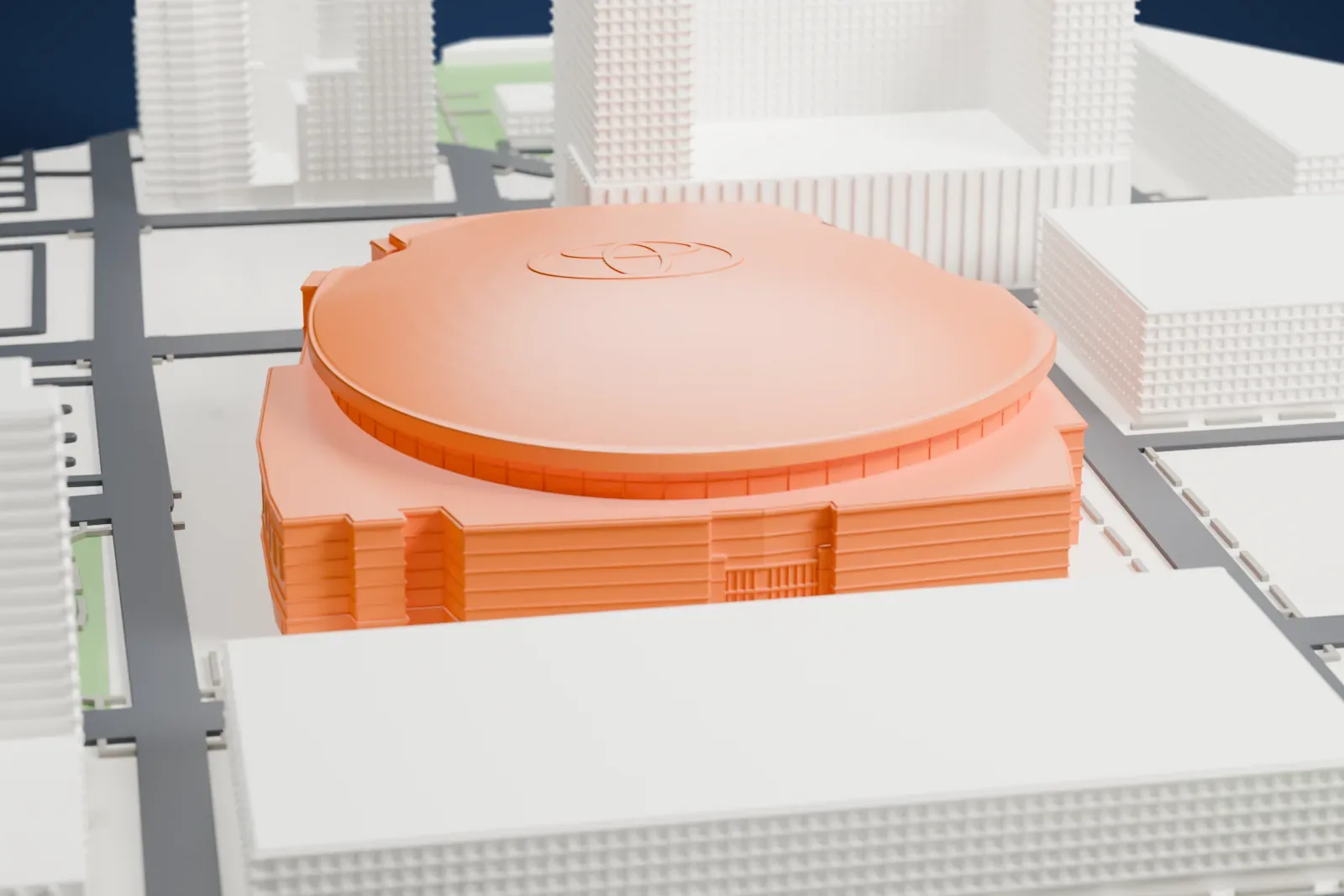 A white 3D print of Toyota Center, a shallow dome inside a projecting eave ring above an elliptical drum on a blocky podium, with a glazed corner entrance, among the surrounding streets and buildings.