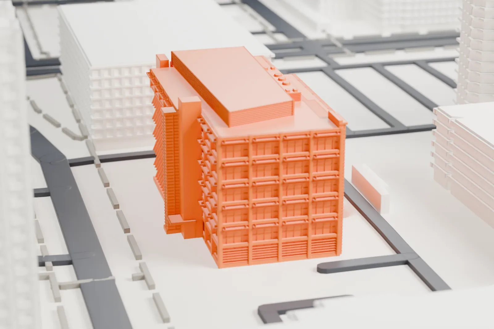 A white 3D print of the Translational Genomics Research Institute, a blocky, mid-rise building with horizontal bands on its walls and small units on the roof, set among larger buildings and streets.