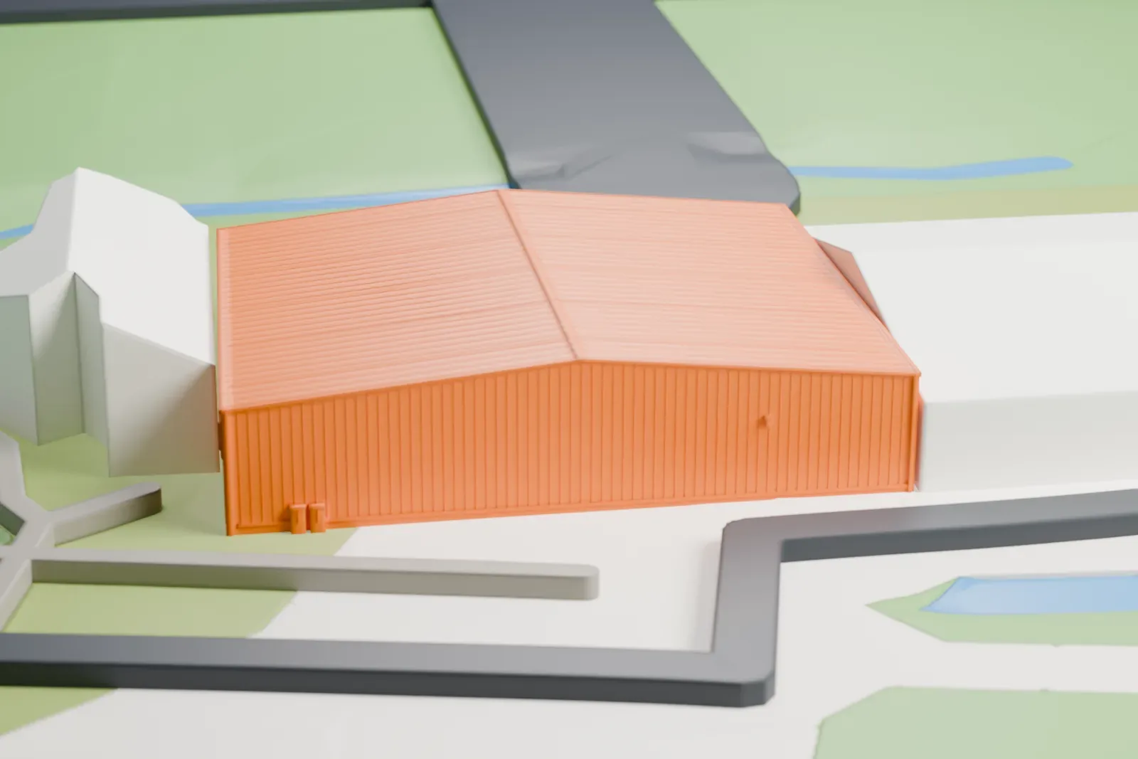 A white 3D print of the Tri-State Warbird Museum hangars with their surroundings.