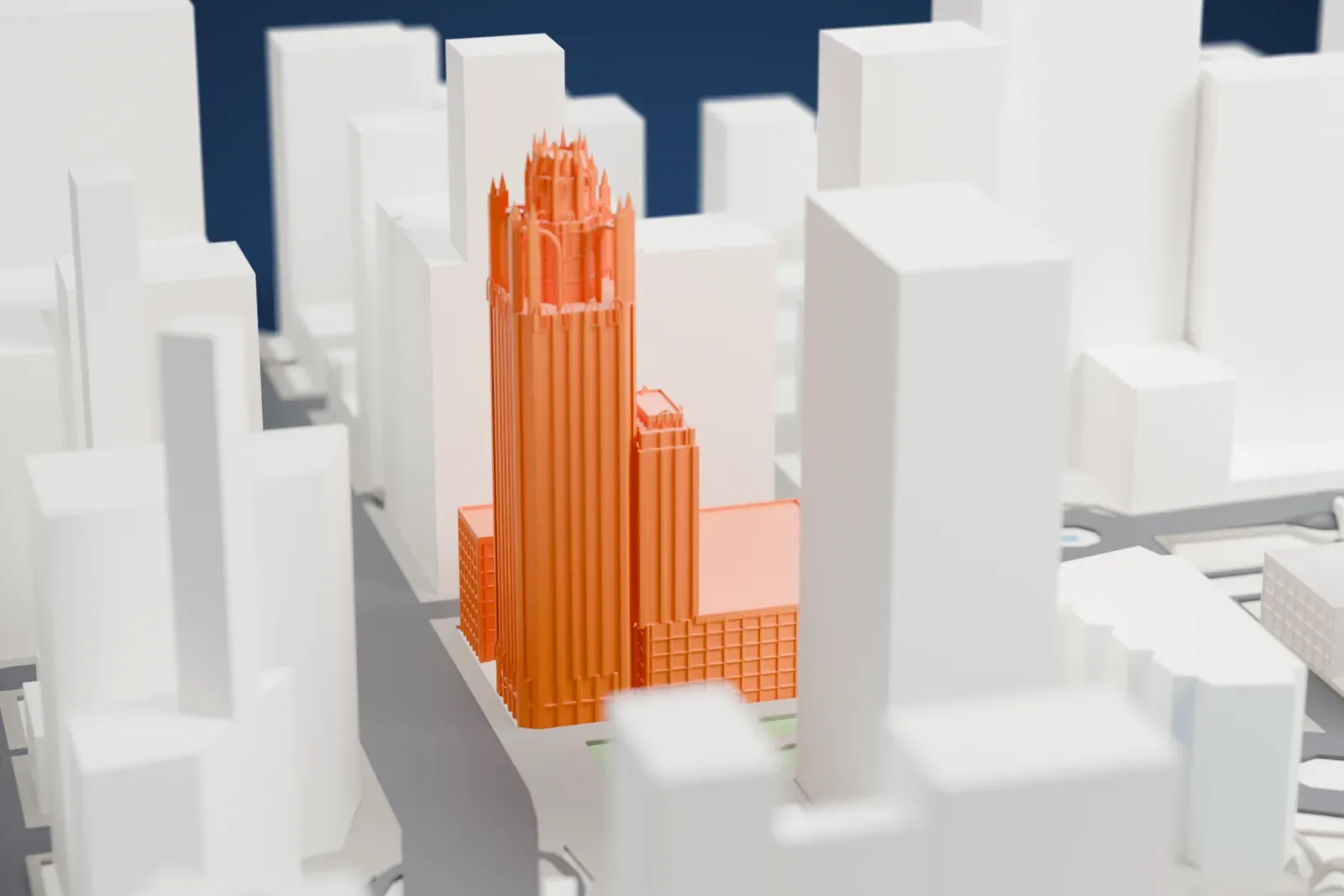 A white 3D print of the Tribune Tower, a tall, narrow skyscraper, among the surrounding city buildings.