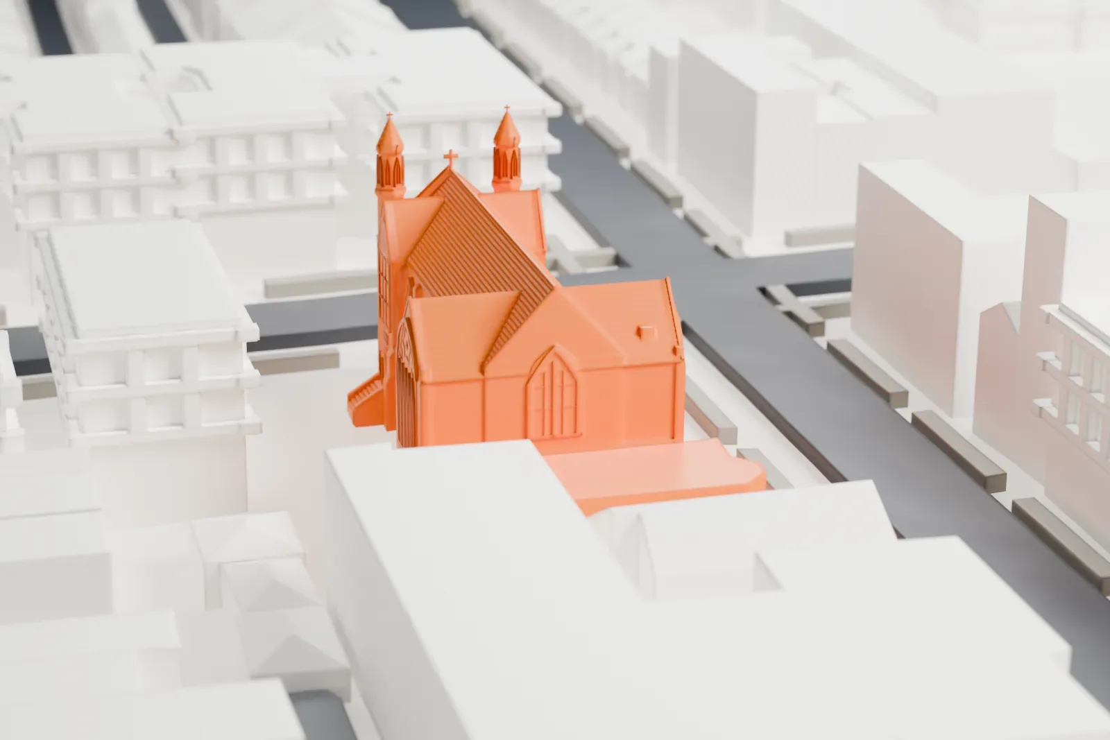 A white 3D print of Trinity Lutheran Church, a church with two slim spires, tall pointed windows and a steep roof, among taller buildings along a street.