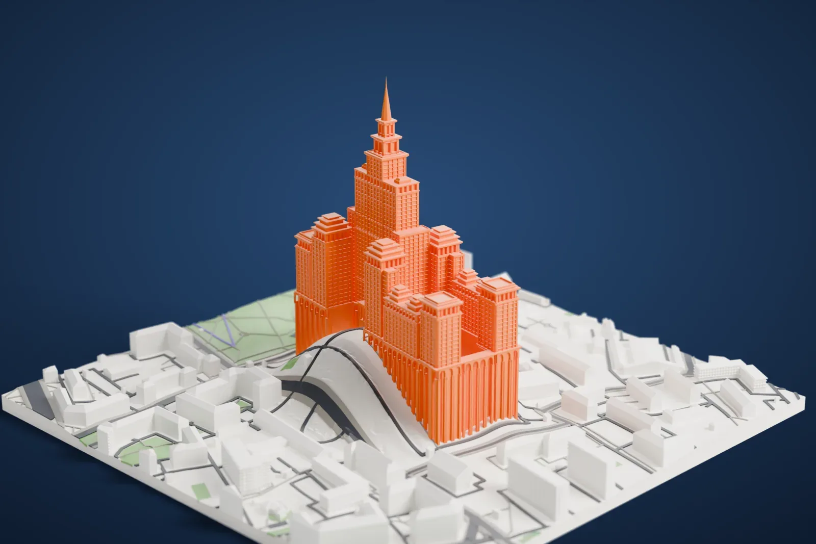 A white 3D print of Triumph Palace, a tall apartment tower standing among the surrounding streets and buildings.