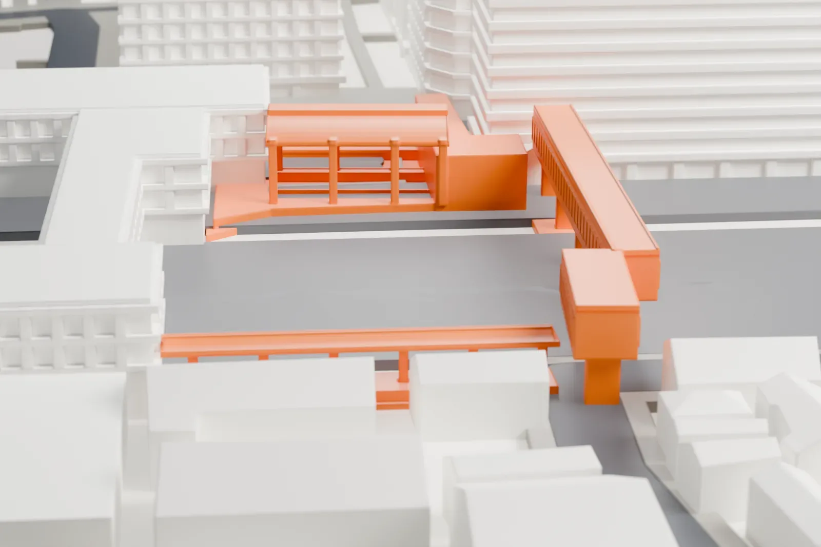 A white 3D print of Tsurumi Station in Yokohama, surrounded by streets and buildings.
