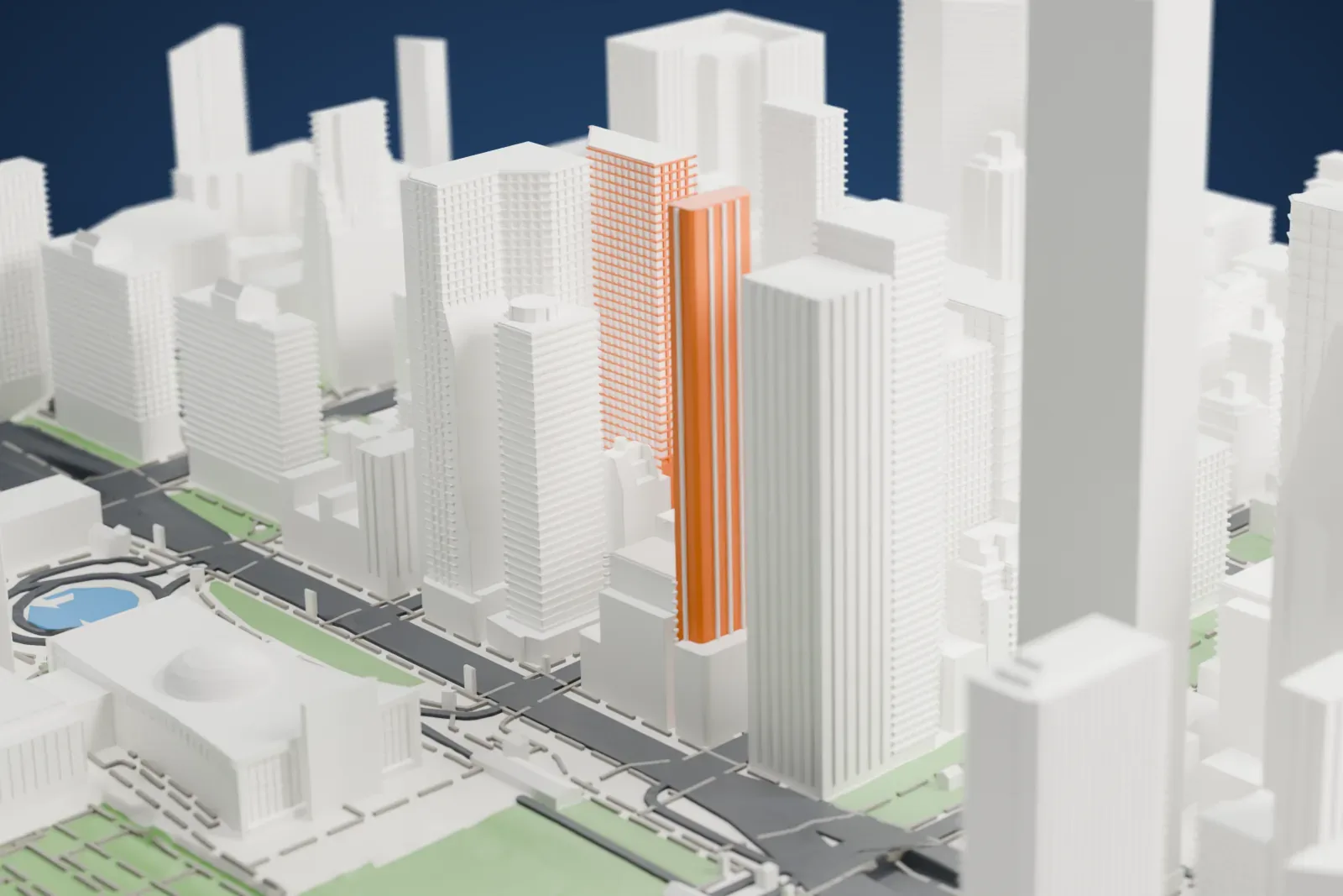 A white 3D print of Two United Nations Plaza, a tall slab with slanted top corners, standing among other Midtown towers.