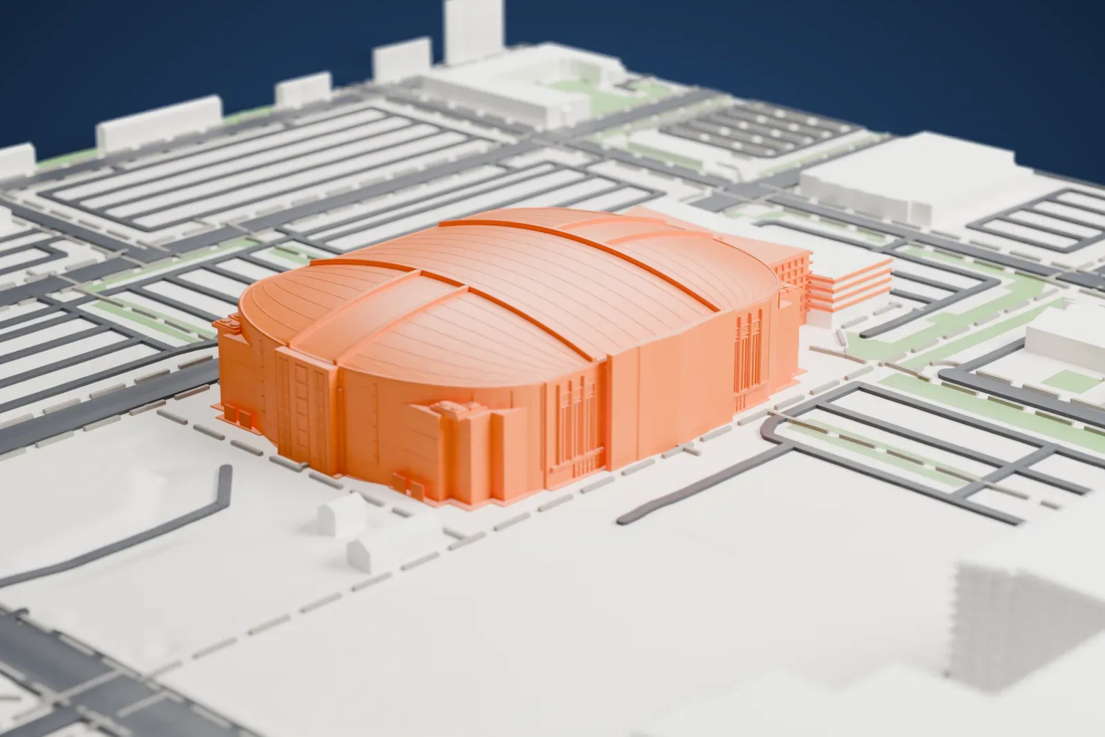 A white 3D print of the United Center, a wide oval arena with a ribbed, curved roof, surrounded by roads, parking lanes and low gray buildings.