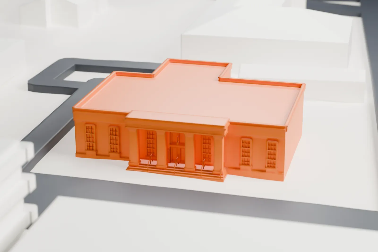 A white 3D print of the Larchmont post office, a flat-roofed building with a columned entrance, on a lot between streets and larger buildings.