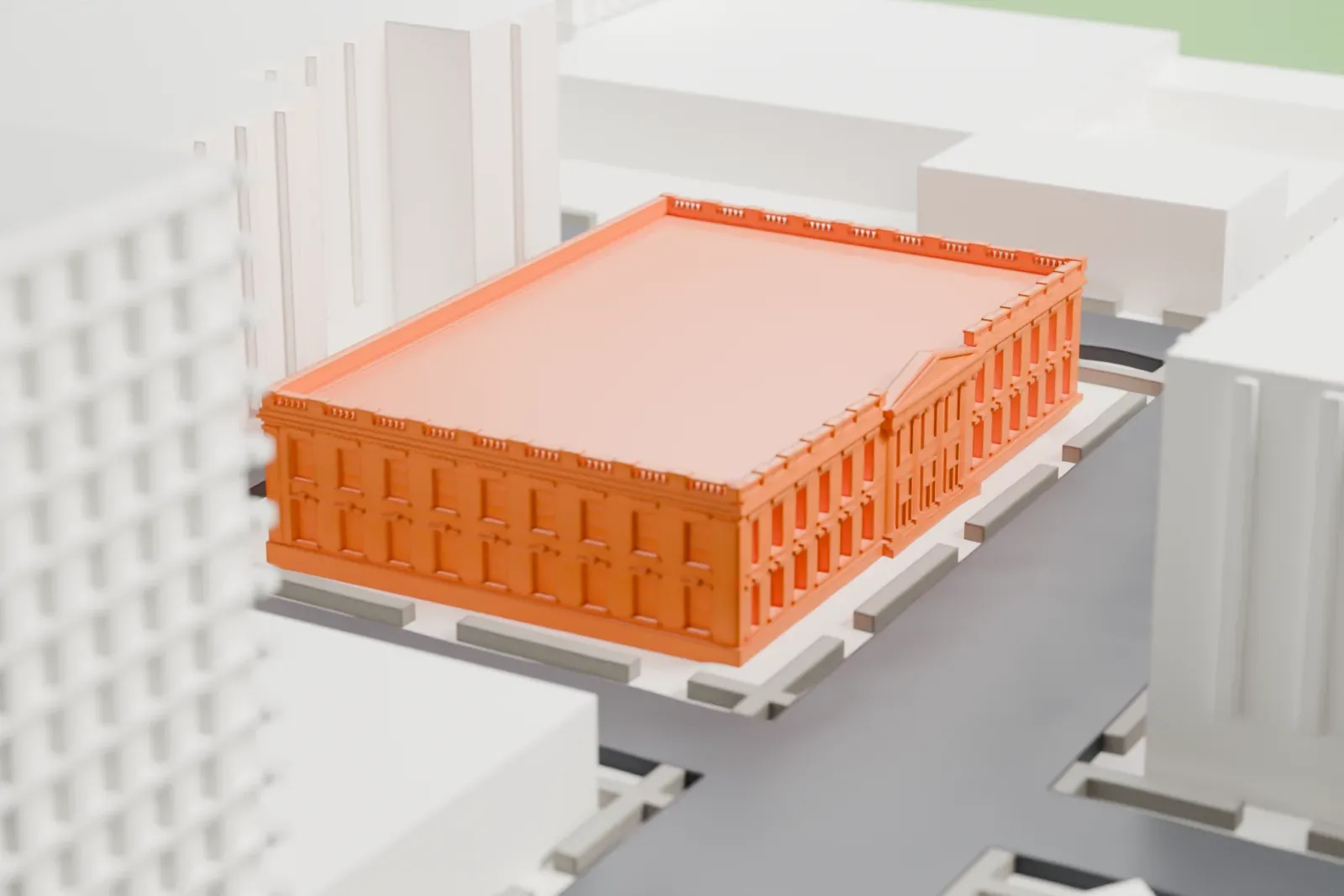 A white 3D print of the Long Island City Post Office, a flat-roofed two-story building filling its own block, with streets and taller buildings around it.