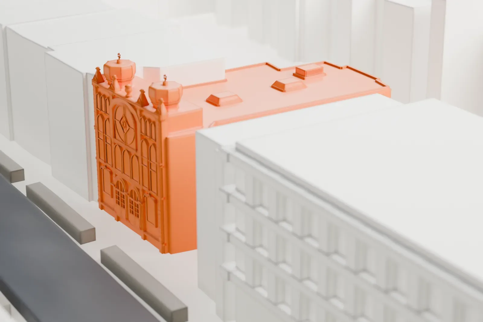 A white 3D print of the United Synagogue of Hoboken, a building with an arched front and two small domed turrets, tucked between neighboring buildings along a street.