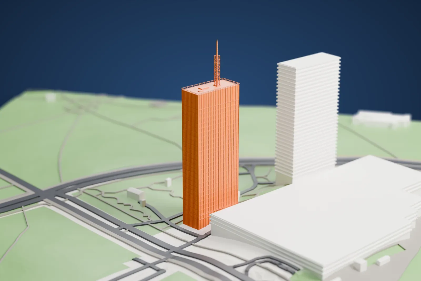 A white 3D print of the Ušće tower, a tall slab with a lattice antenna mast on its roof, beside another tall building, with parkland, roads and large low buildings around it.