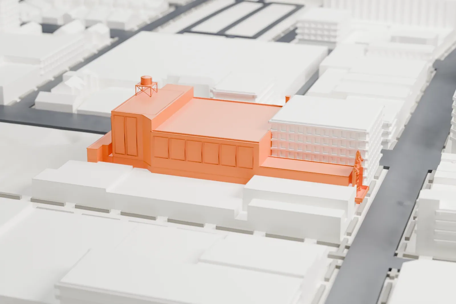 A white 3D print of the Valencia Theatre, a large boxy auditorium with a narrow decorated front and a rooftop water tank, among low buildings and streets.