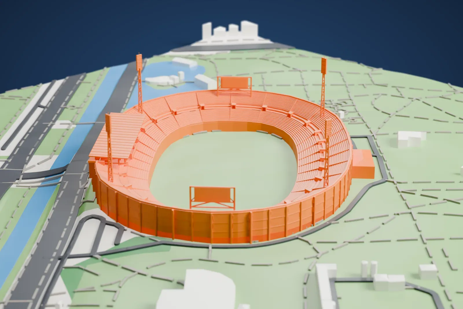 A white 3D print of Vasil Levski National Stadium, an oval stadium with four tall floodlight towers, set in green parkland with winding paths, a lake and a blue waterway nearby.