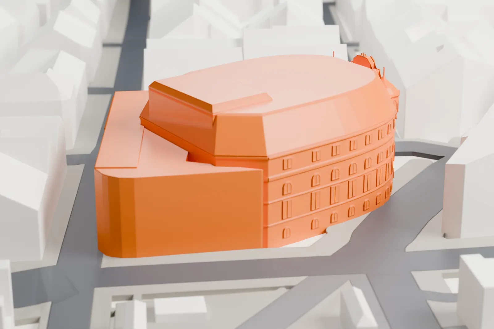 A white 3D print of the Vienna Volksoper among the surrounding streets and buildings.