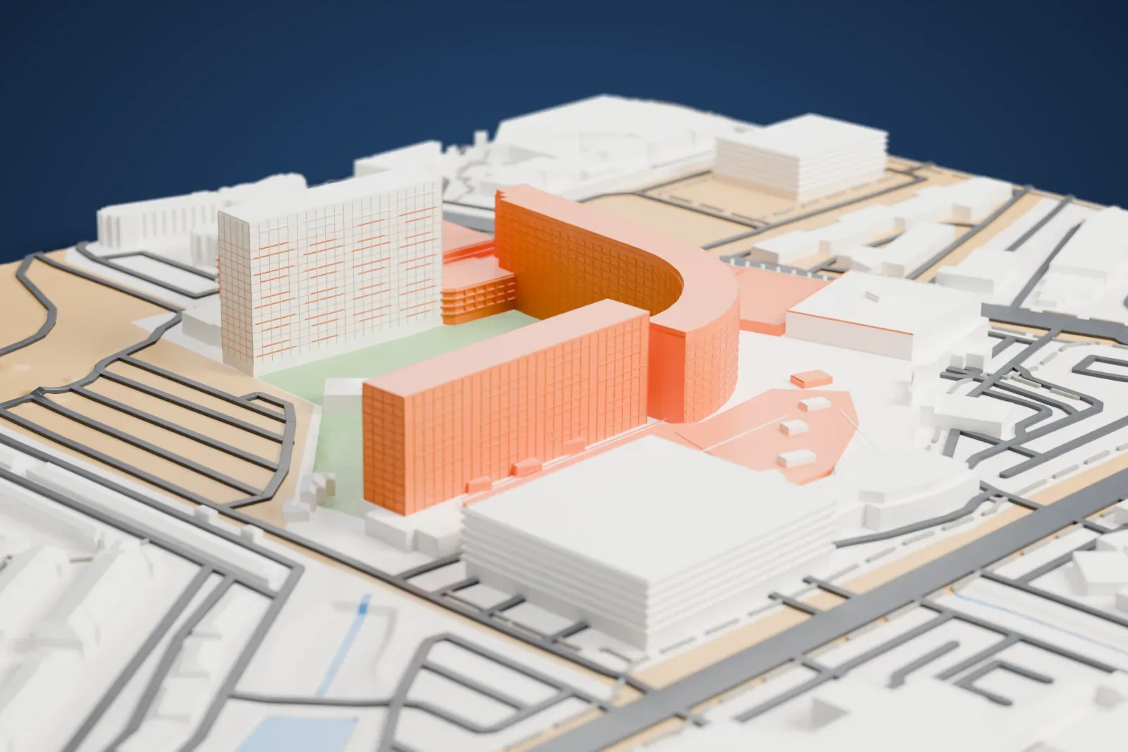 A white 3D print of Virgin Hotels Las Vegas, a long curved hotel wing and taller blocks wrapped around a green lawn, with roads and parking lots around it.